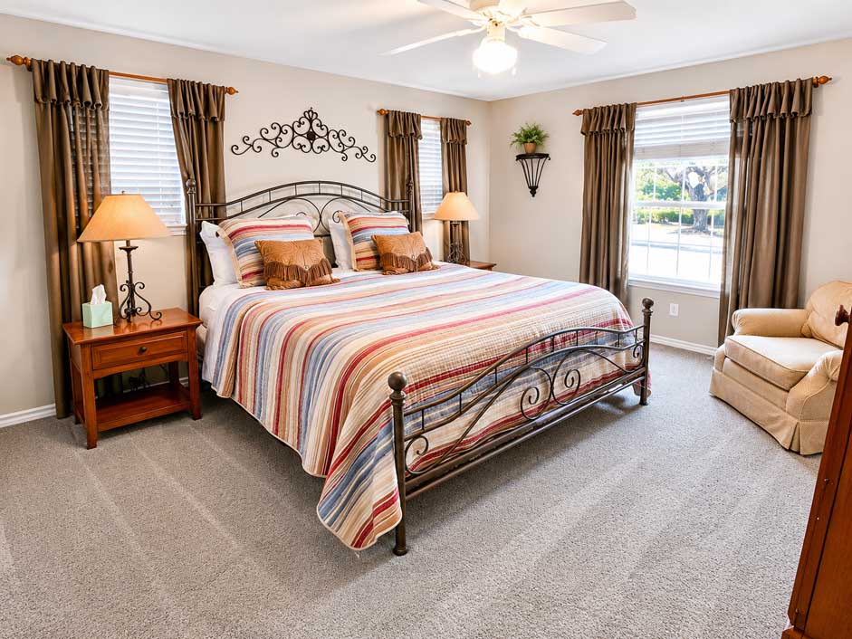 The Live Oak Suite at The Ranch House featuring a king bedroom with spacious accommodations in Bells, Texas.