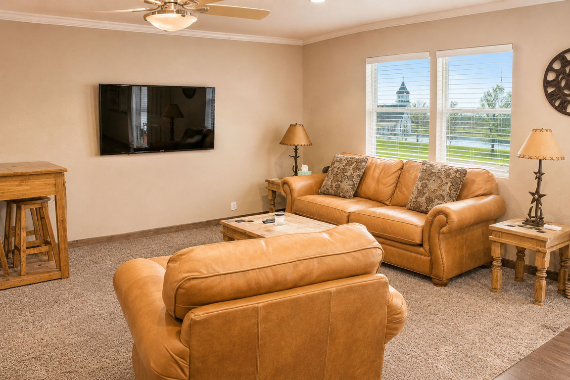 The Longhorn living room is a studio cabin located on Willowood Ranch in Bells Texas